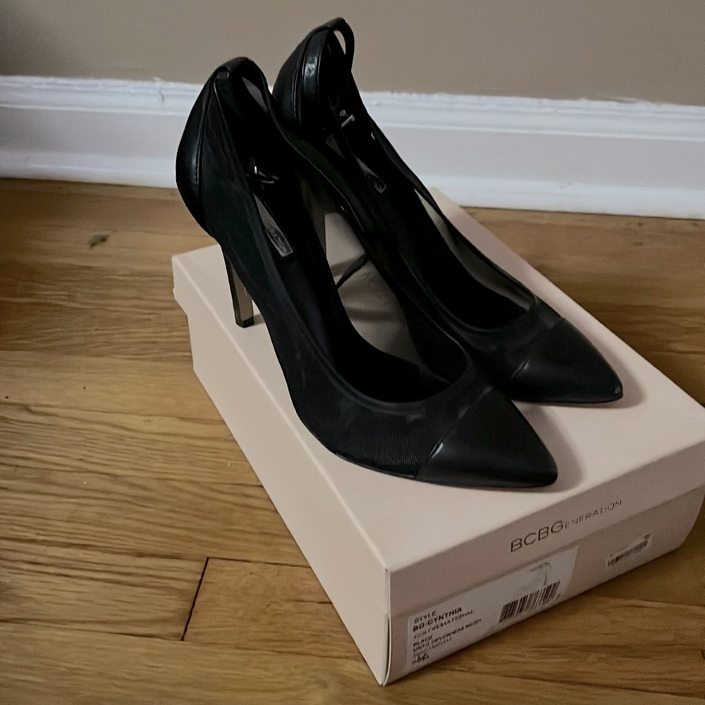 BCBG black leather pumps with see through material and wrap around strap